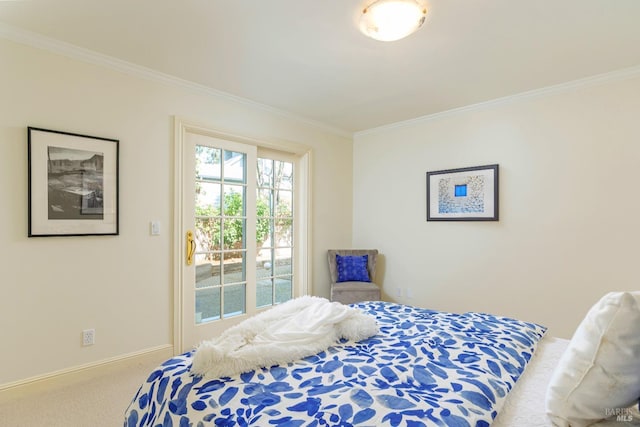 bedroom with carpet flooring, baseboards, and ornamental molding