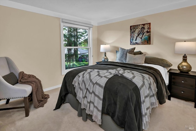 carpeted bedroom with baseboards