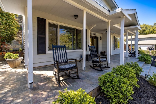 view of patio / terrace with covered porch and a ceiling fan