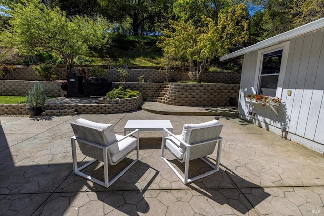view of patio / terrace with fence