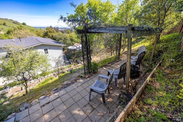 view of patio featuring a fire pit