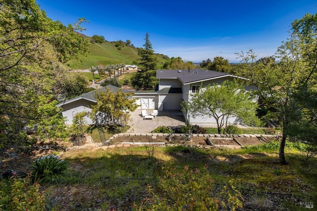 248 Vine St, Vacaville, CA 95688 - rear view of property with a patio