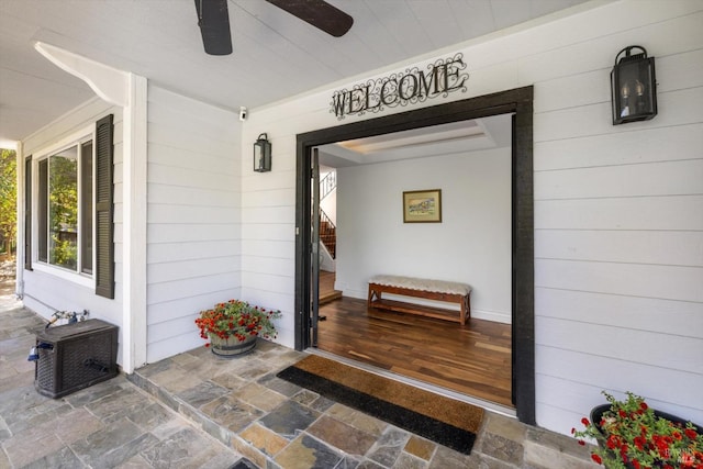 view of exterior entry featuring a porch