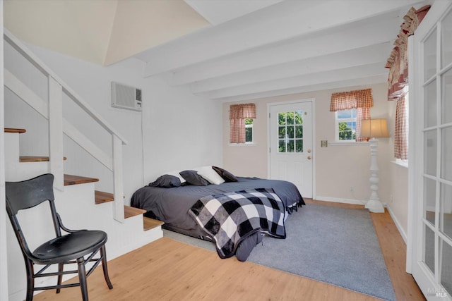 752 Chula Vista Way, Suisun City, CA 94585 - bedroom with a wall mounted air conditioner, baseboards, wood finished floors, and beam ceiling