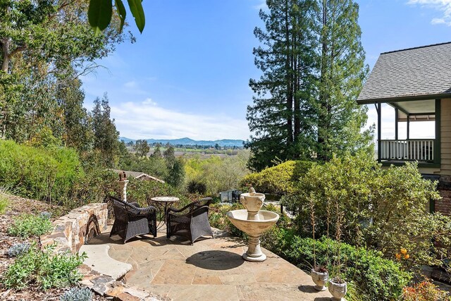 view of patio featuring a mountain view