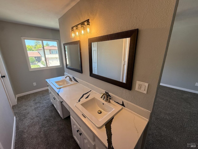 179 Midvale Dr, Vacaville, CA 95687 - bathroom featuring double vanity and a textured wall