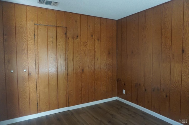237 Sunflower Ct, Fairfield, CA 94533 - empty room featuring wood finished floors, baseboards, and wooden walls