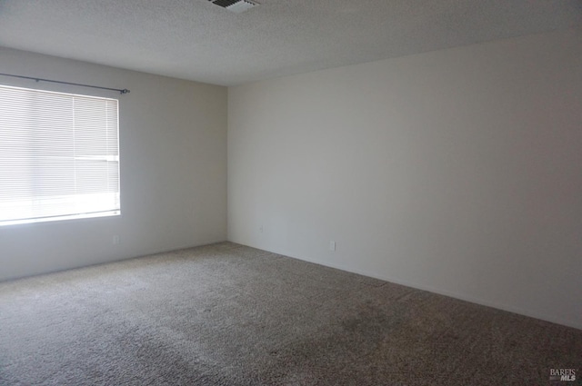 237 Sunflower Ct, Fairfield, CA 94533 - carpeted empty room featuring a textured ceiling