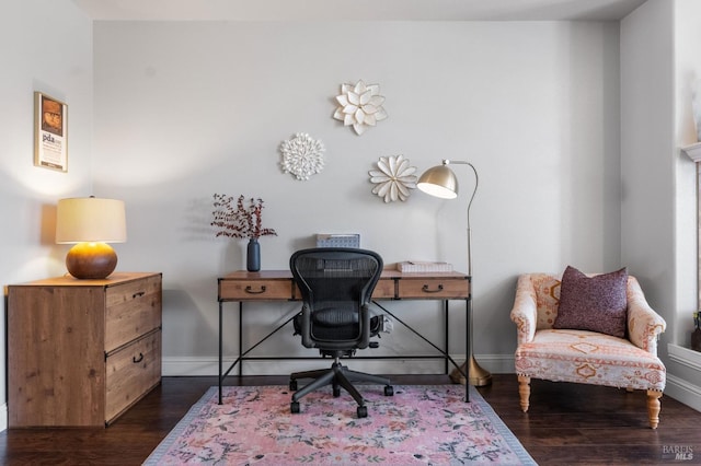office with baseboards and dark wood-style flooring