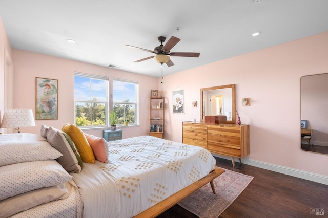 bedroom with visible vents, baseboards, wood finished floors, recessed lighting, and a ceiling fan