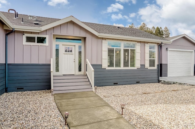 view of front facade featuring crawl space, driveway, a garage, and roof with shingles
