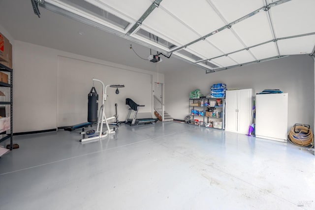 garage featuring a garage door opener