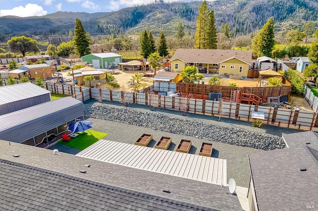 bird's eye view featuring a residential view and a mountain view