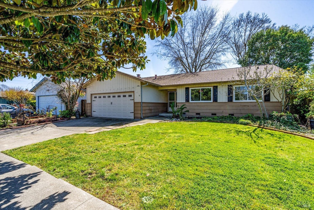 single story home featuring crawl space, driveway, a front lawn, and an attached garage