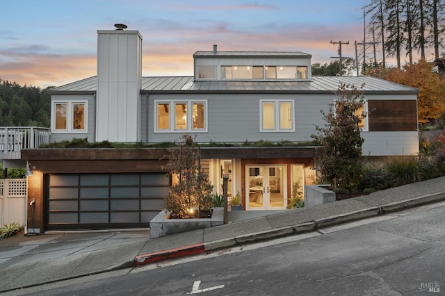 35 Bernard St, Mill Valley, CA 94941 - back of property with a standing seam roof, french doors, driveway, metal roof, and a chimney