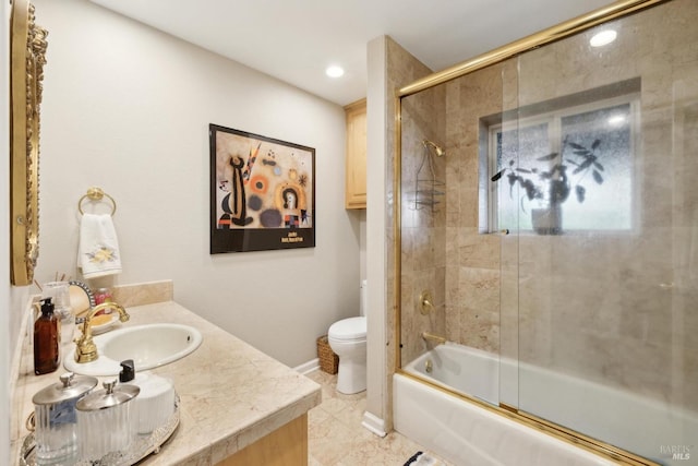 bathroom featuring combined bath / shower with glass door, toilet, vanity, baseboards, and recessed lighting