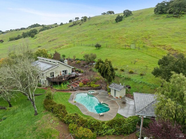 birds eye view of property featuring a rural view