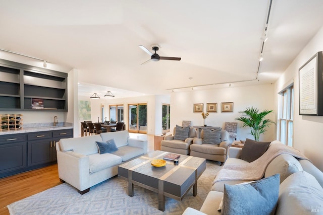 1777 Adams St, Saint Helena, CA 94574 - living area featuring wet bar, rail lighting, and plenty of natural light