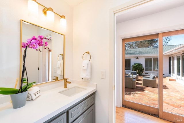 1777 Adams St, Saint Helena, CA 94574 - bathroom with a healthy amount of sunlight, vanity, and wood finished floors