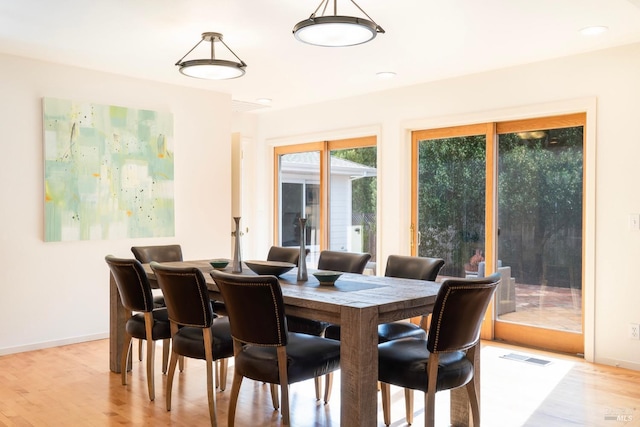 1777 Adams St, Saint Helena, CA 94574 - dining space with visible vents, light wood-type flooring, and baseboards