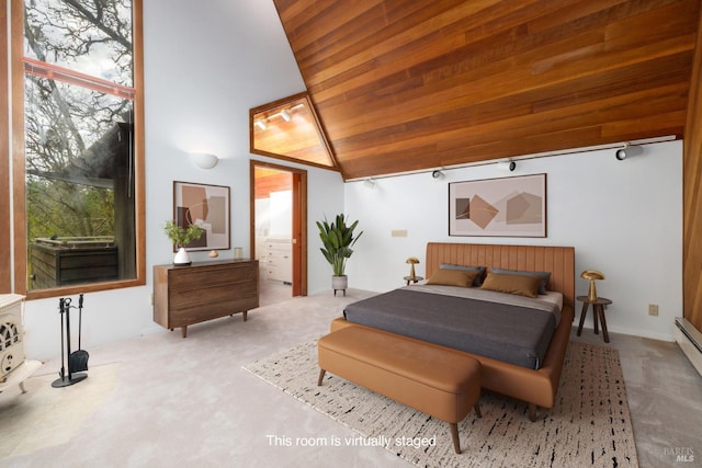 bedroom with wood ceiling, carpet floors, connected bathroom, and vaulted ceiling