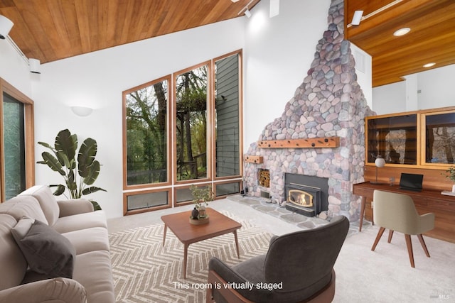 living area with wooden ceiling, carpet flooring, and recessed lighting