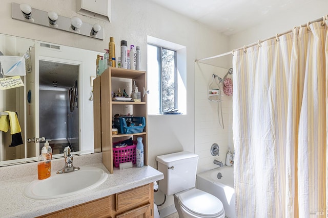bathroom featuring visible vents, toilet, vanity, and shower / bathtub combination with curtain
