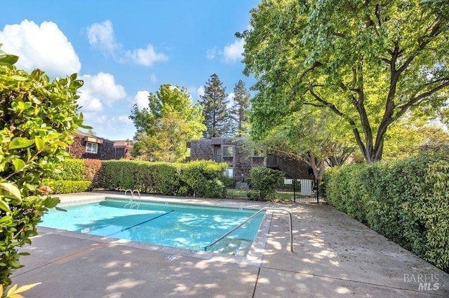 pool featuring fence