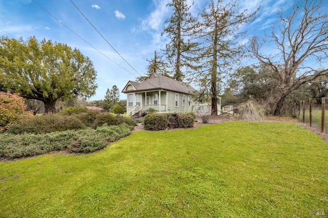 view of yard featuring fence