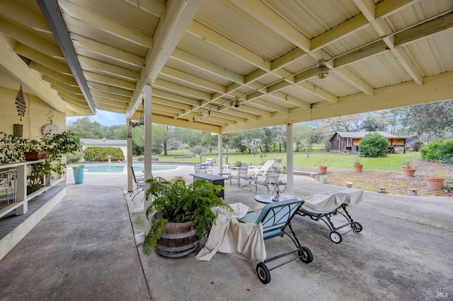 view of patio featuring an outdoor pool