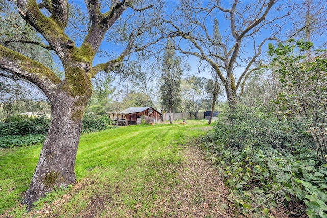 view of yard with fence