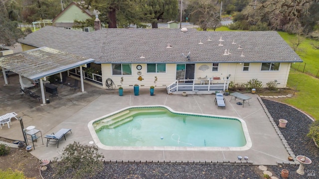 outdoor pool with a patio