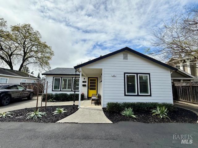 view of front of house with fence