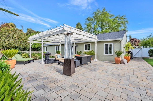 view of patio / terrace with outdoor lounge area, a gate, fence, and a pergola