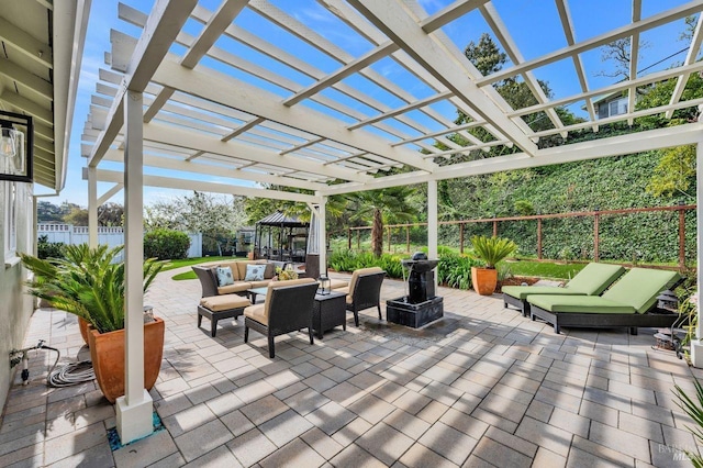 view of patio / terrace with a water view, a fenced backyard, an outdoor hangout area, and a pergola