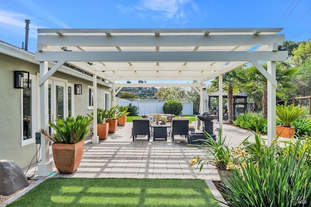 view of patio / terrace with fence, a pergola, a gazebo, and outdoor lounge area