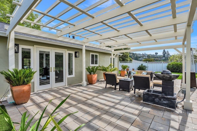 view of patio / terrace with french doors, an outdoor hangout area, a pergola, and fence