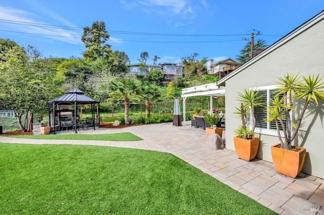 view of yard with a patio, a gazebo, and a pergola