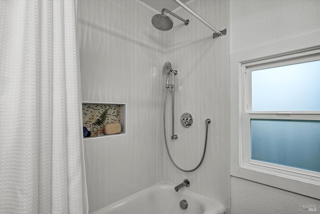 full bathroom with shower / tub combo