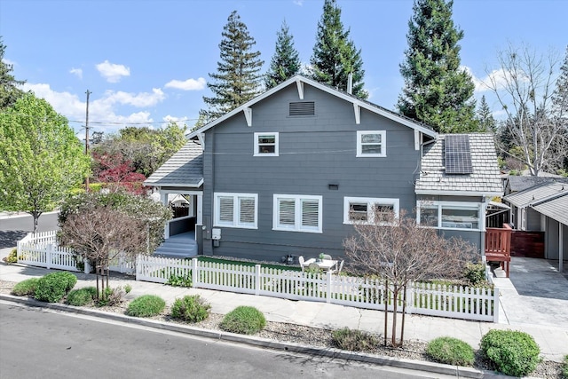 exterior space featuring a fenced front yard