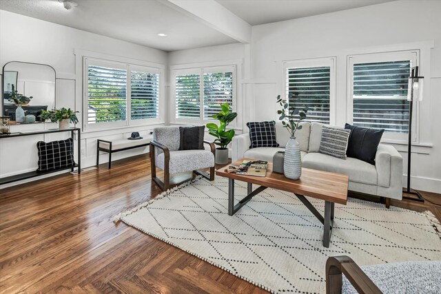 living area with parquet flooring