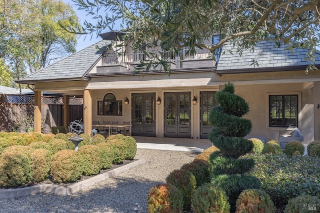 1149 Hudson Ave, Saint Helena, CA 94574 - property entrance with stucco siding, french doors, and fence