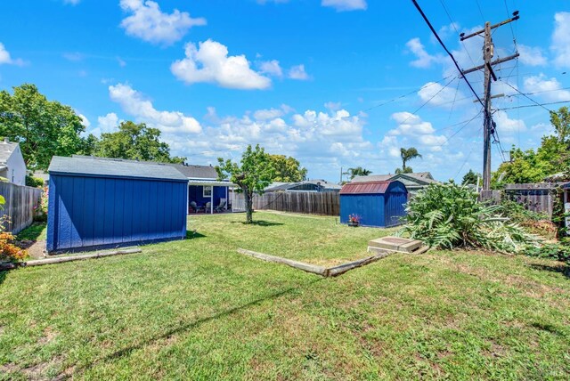 624 Annette Ave, Vallejo, CA 94591 - view of yard featuring a storage unit and an outdoor structure