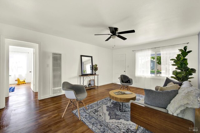 624 Annette Ave, Vallejo, CA 94591 - living room with a heating unit, ceiling fan, wood finished floors, and baseboards