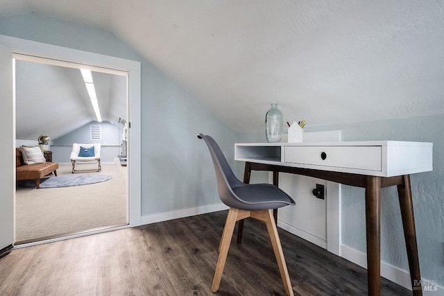 office space with baseboards, wood finished floors, and lofted ceiling