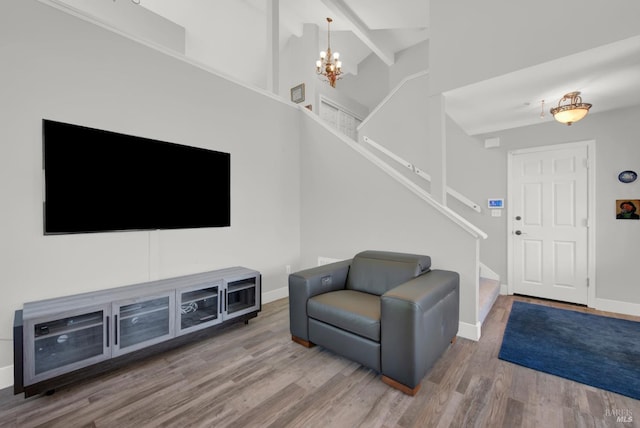 280 Park St, Concord, CA 94520 - living area with a chandelier, wood finished floors, stairs, baseboards, and beam ceiling