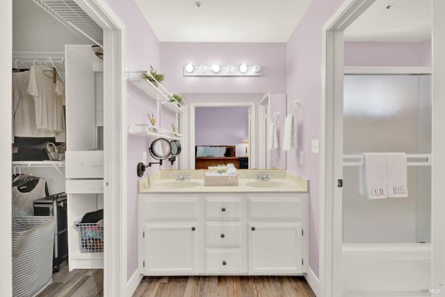 280 Park St, Concord, CA 94520 - ensuite bathroom with wood finished floors, double vanity, and a walk in closet