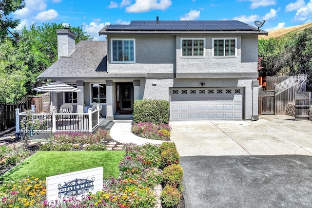 280 Park St, Concord, CA 94520 - view of front facade with solar panels, a chimney, a garage, and driveway