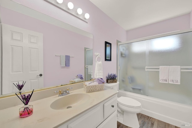 280 Park St, Concord, CA 94520 - bathroom with vanity, wood finished floors, toilet, and enclosed tub / shower combo