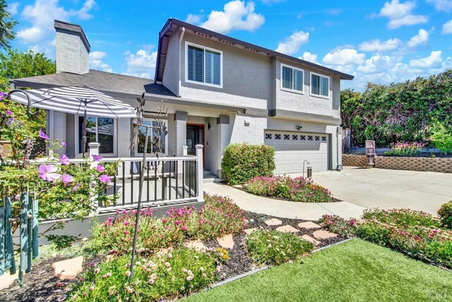 280 Park St, Concord, CA 94520 - traditional-style home with a garage, a chimney, driveway, stucco siding, and covered porch